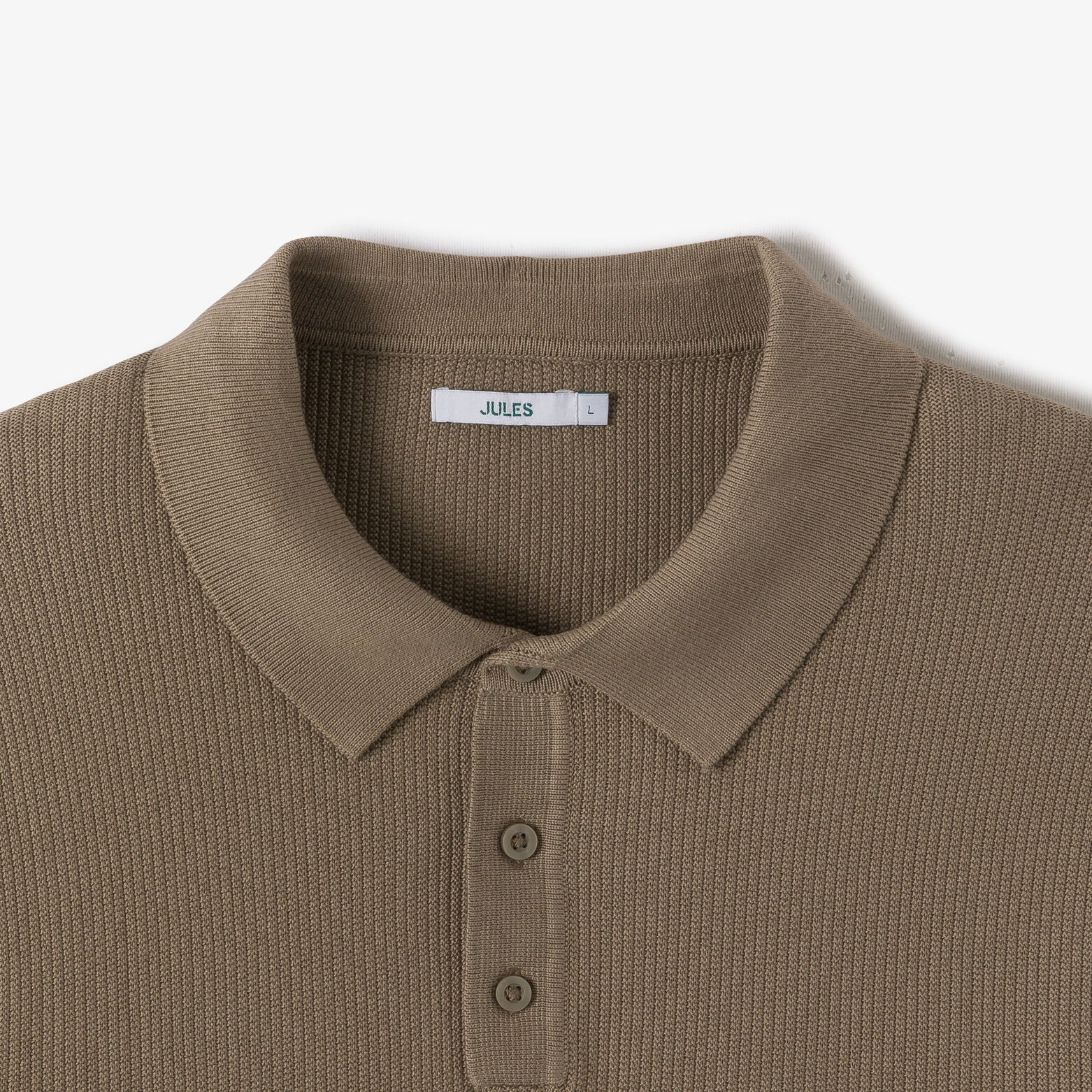Polo en maille col boutonn&eacute; jeux de points