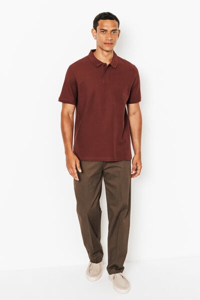 Effen polo in piqu&eacute;katoen met korte mouwen