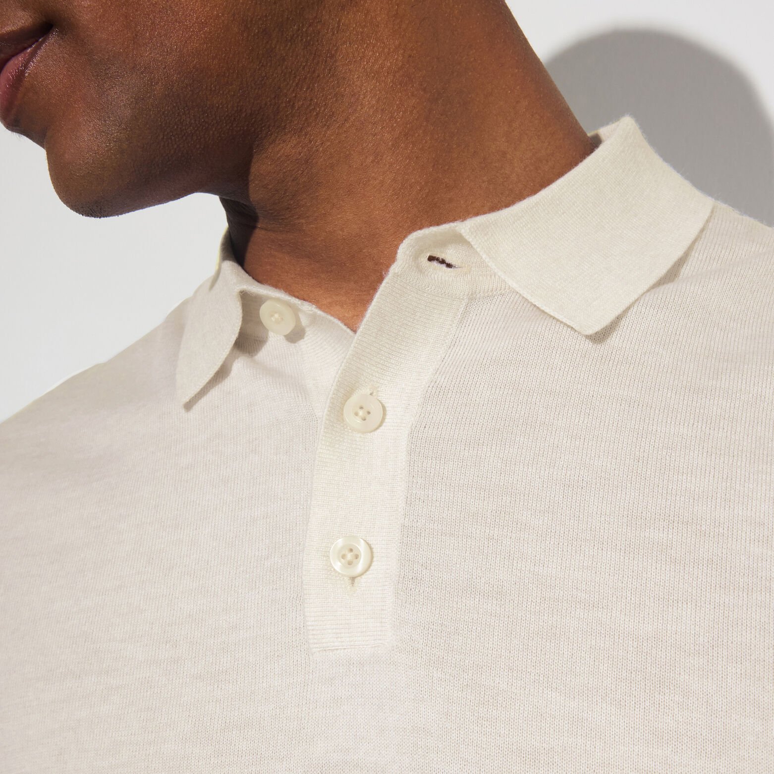 Polo col boutonn&eacute; en maille en laine de m&eacute;rinos