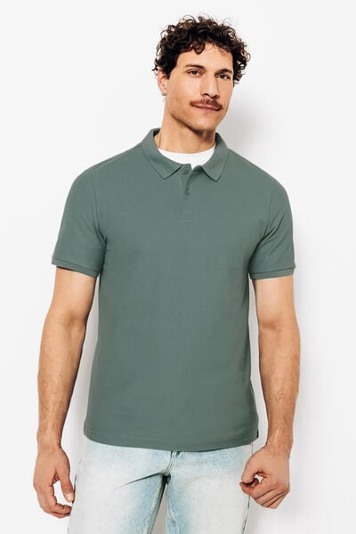 Effen polo in piqu&eacute;katoen met korte mouwen