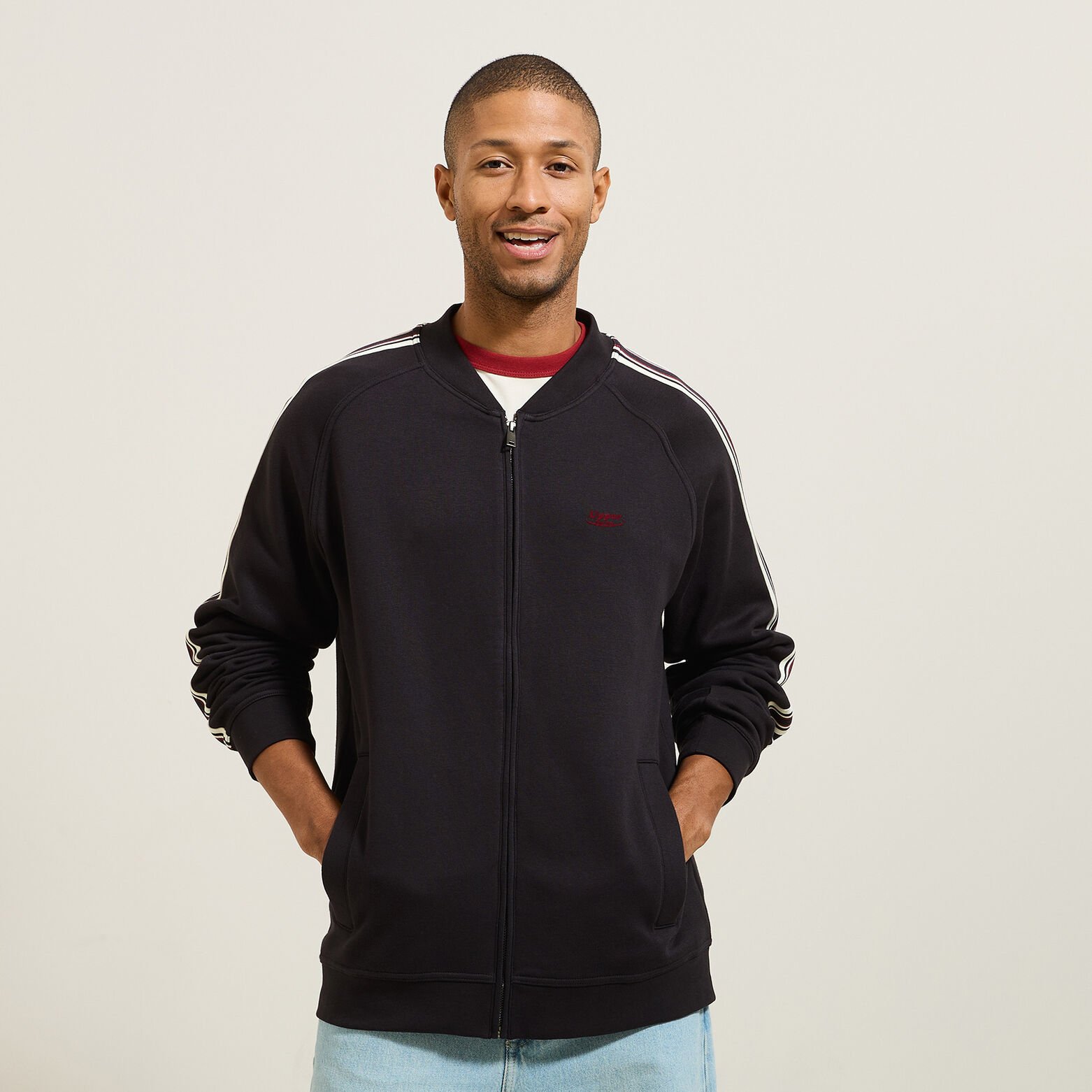 Sweater met rits en mouwstrepen