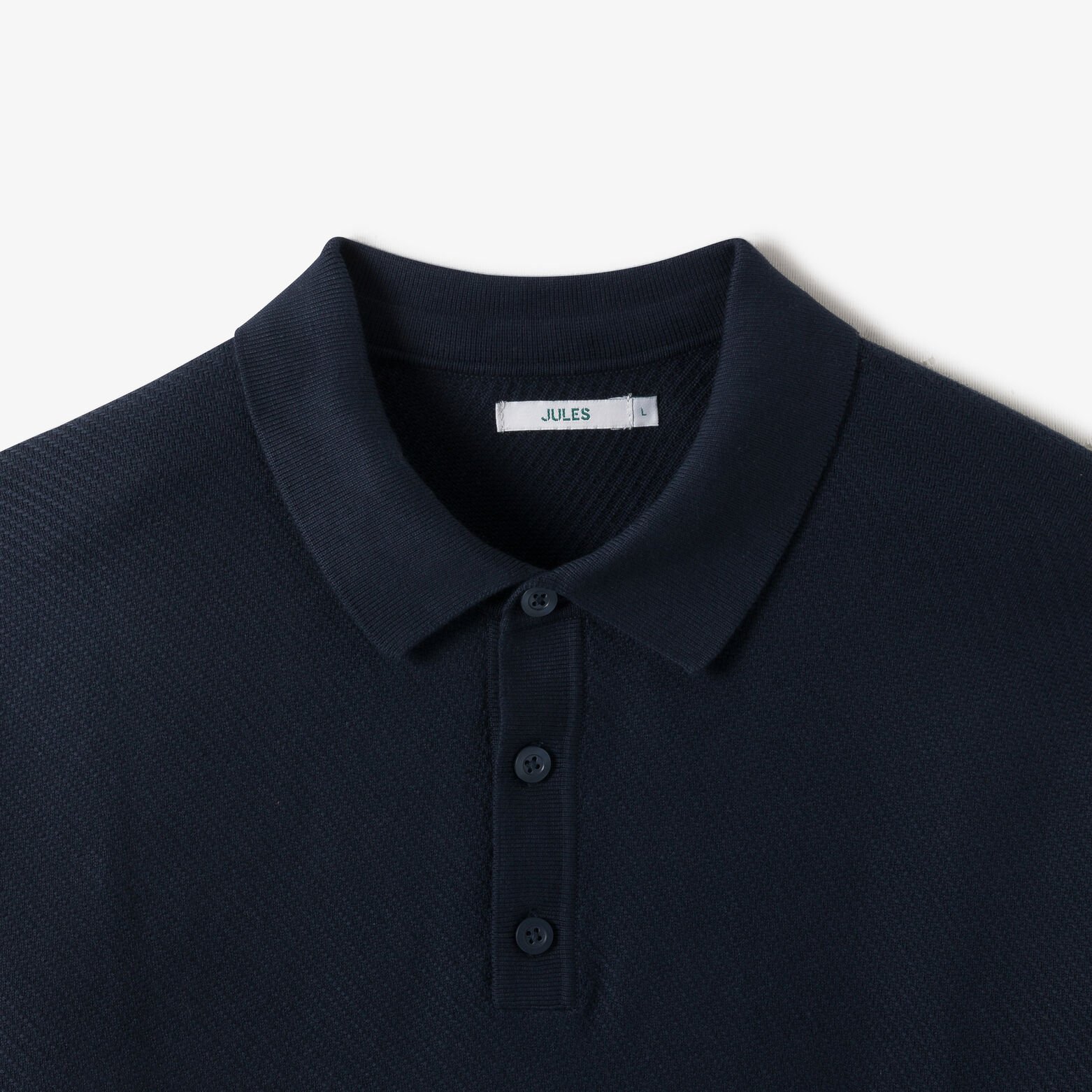 Polo en maille col boutonn&eacute; jeux de points