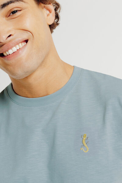 T-shirt in gevlamde stof met borduursel op de bors