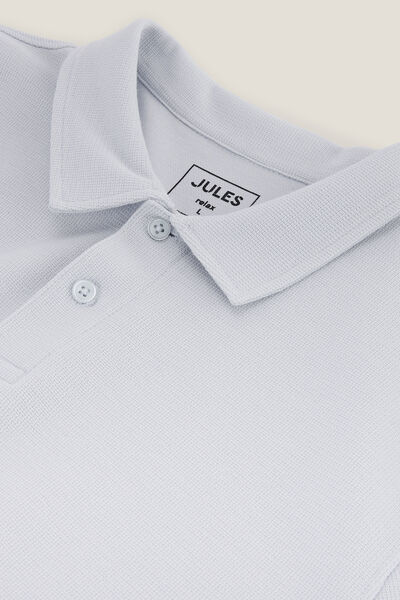 Polo manches courtes relax uni textur&eacute;