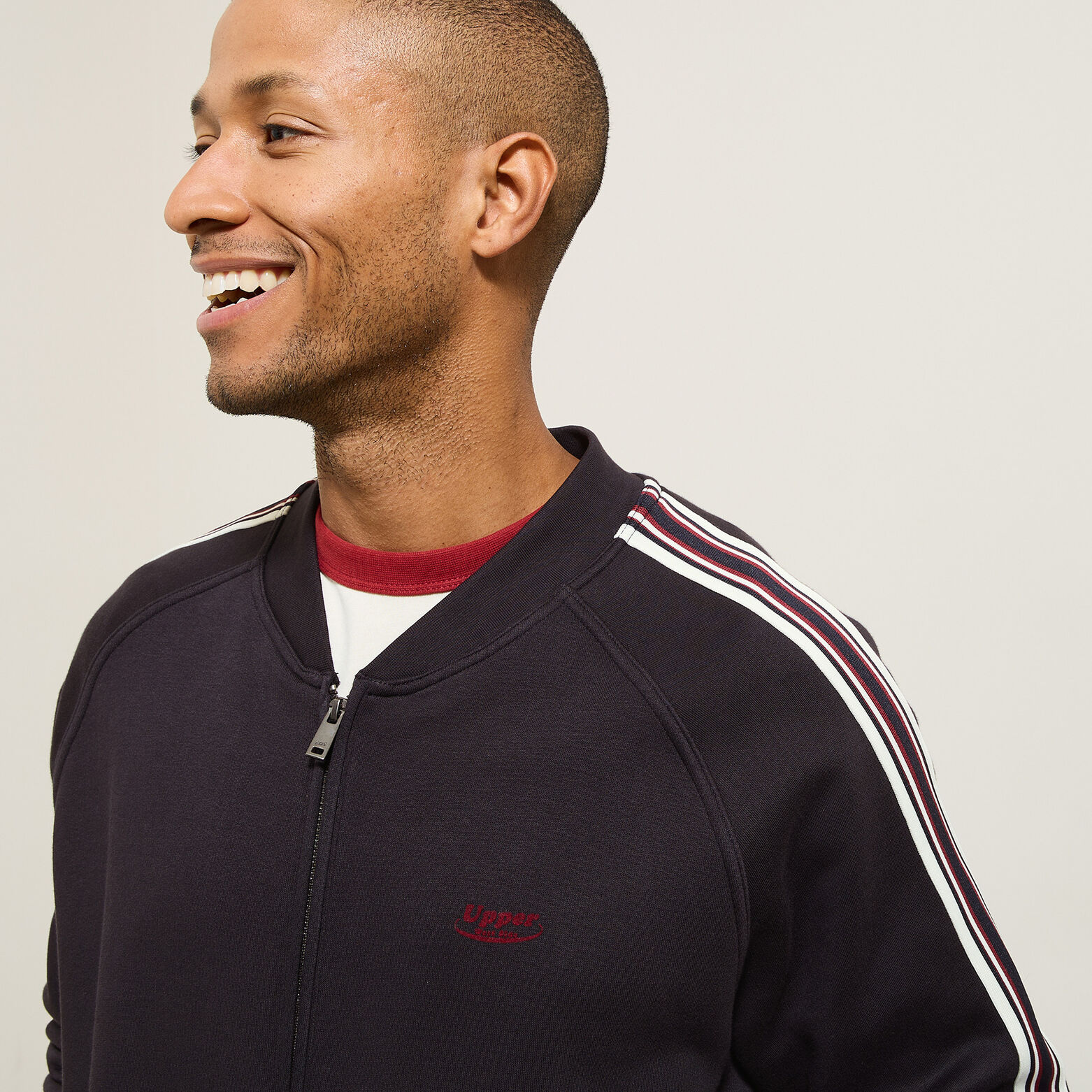 Sweater met rits en mouwstrepen