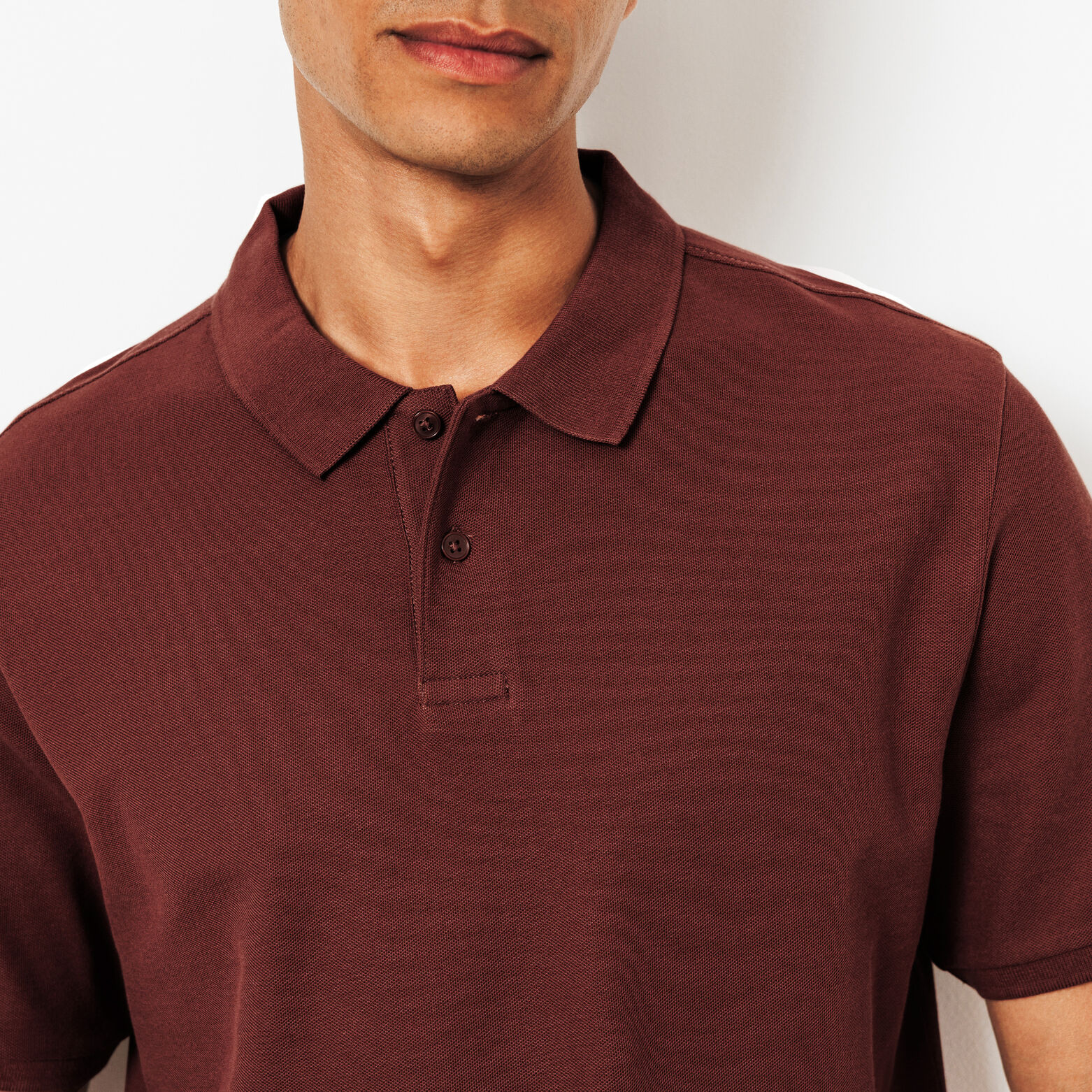 Effen polo in piqu&eacute;katoen met korte mouwen