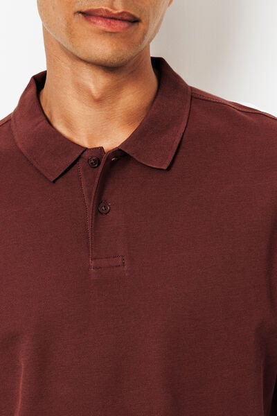 Effen polo in piqu&eacute;katoen met korte mouwen