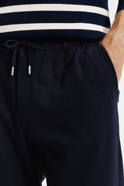 Pantalon chino tapered en maille