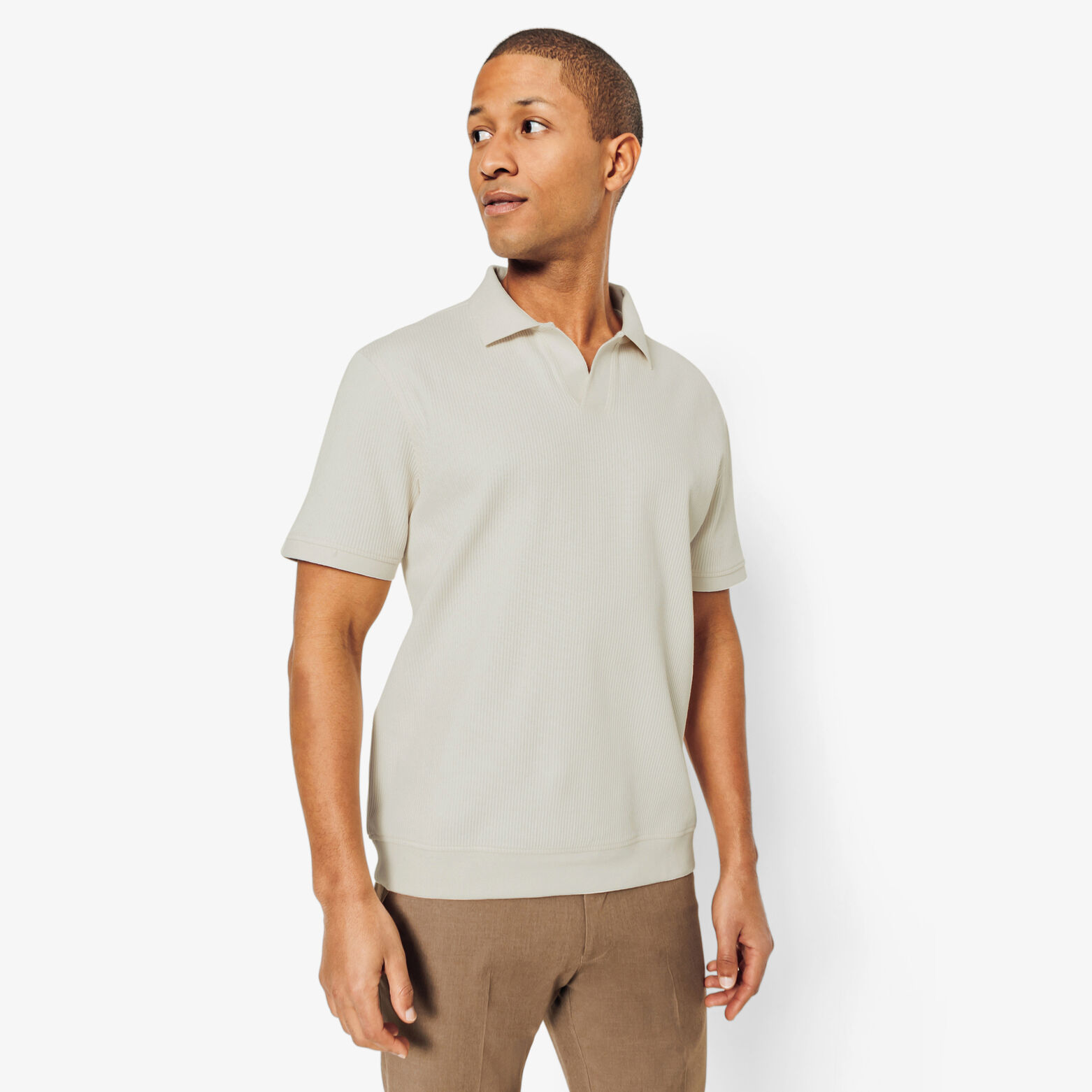 Polo in textuurstof met korte mouwen en resortkraa