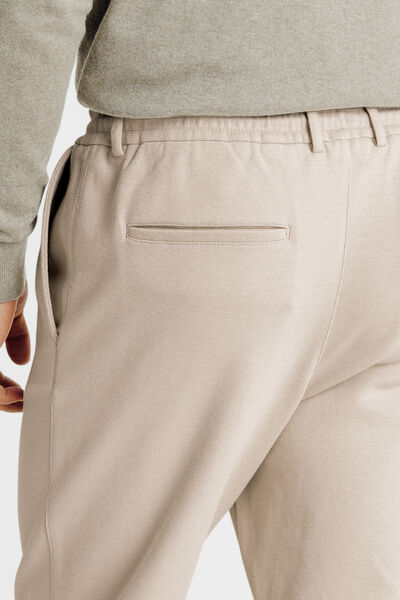 Pantalon chino tapered en maille