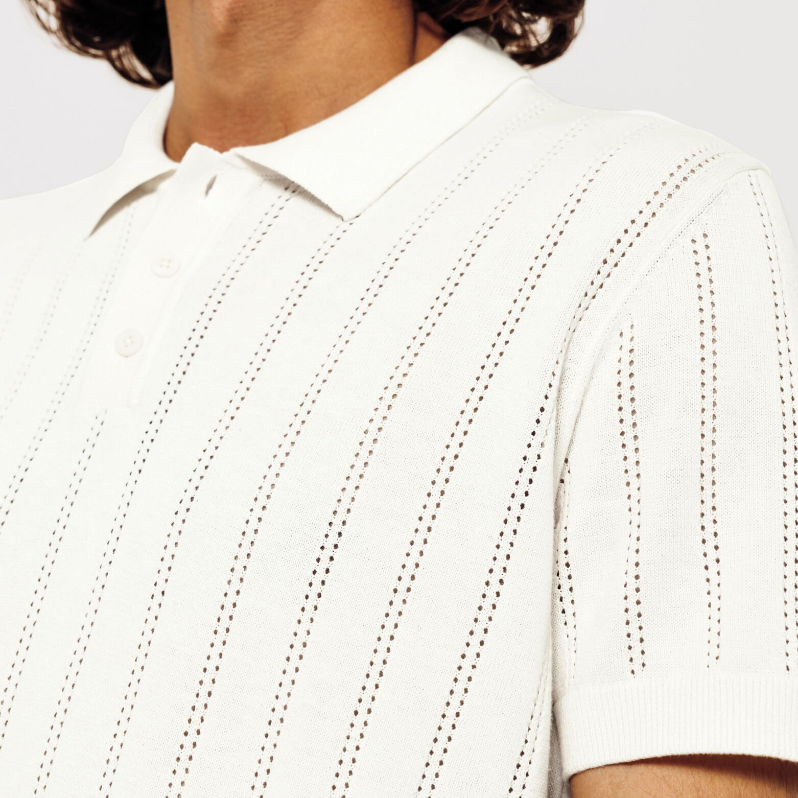 Polo en maille jeux de points fantaisie