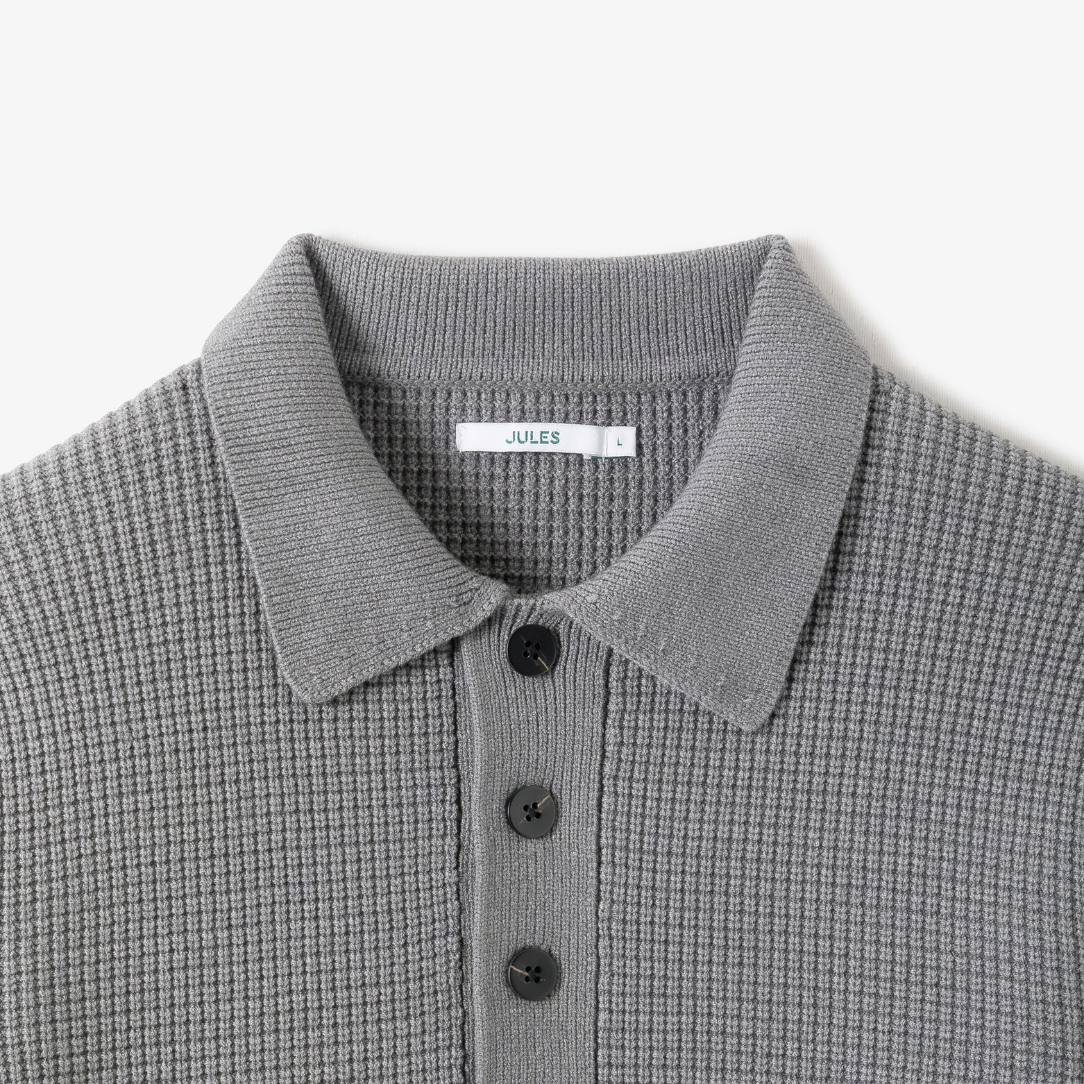 Pull col polo boutonn&eacute; gaufr&eacute;