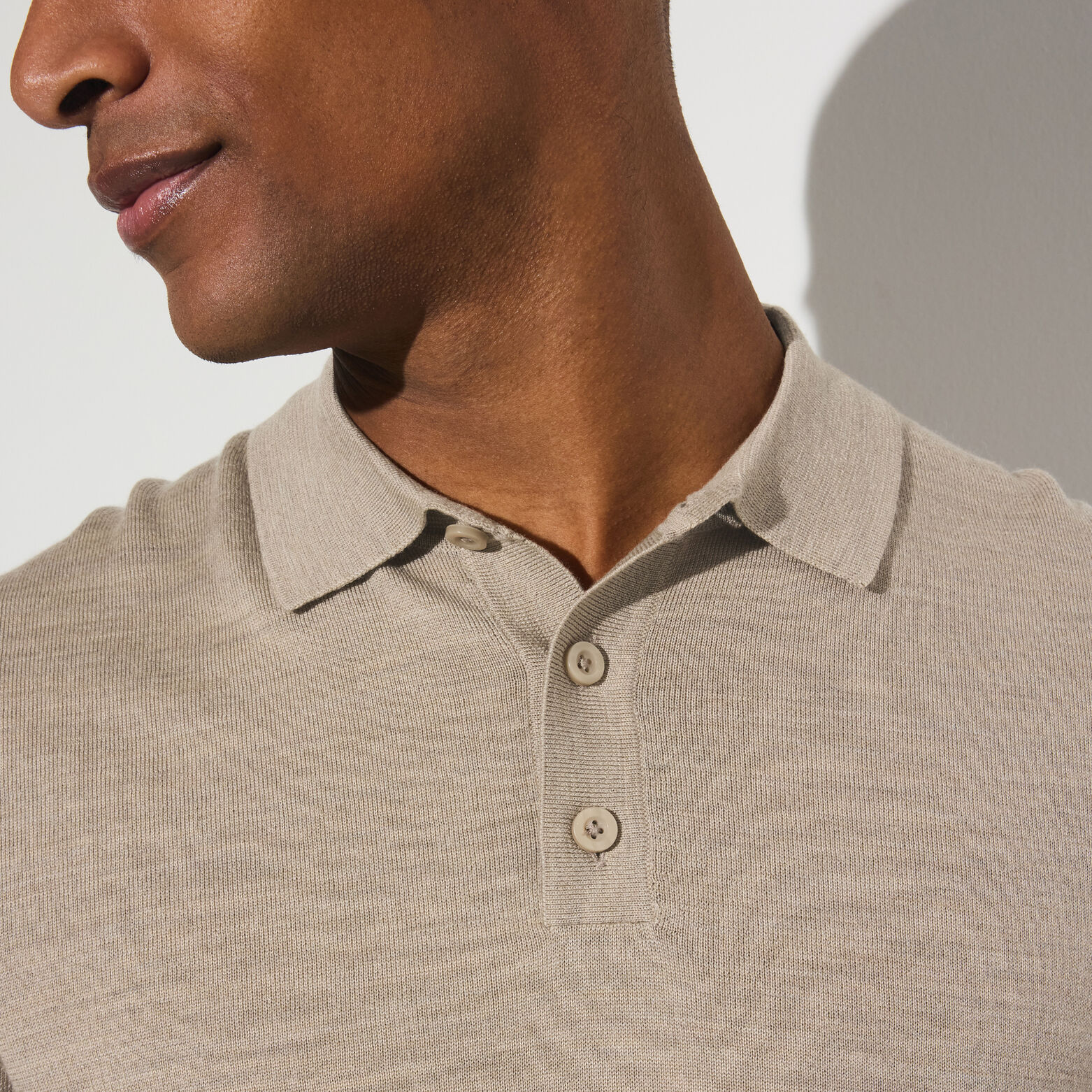 Polo met knoopkraag in merinoswol