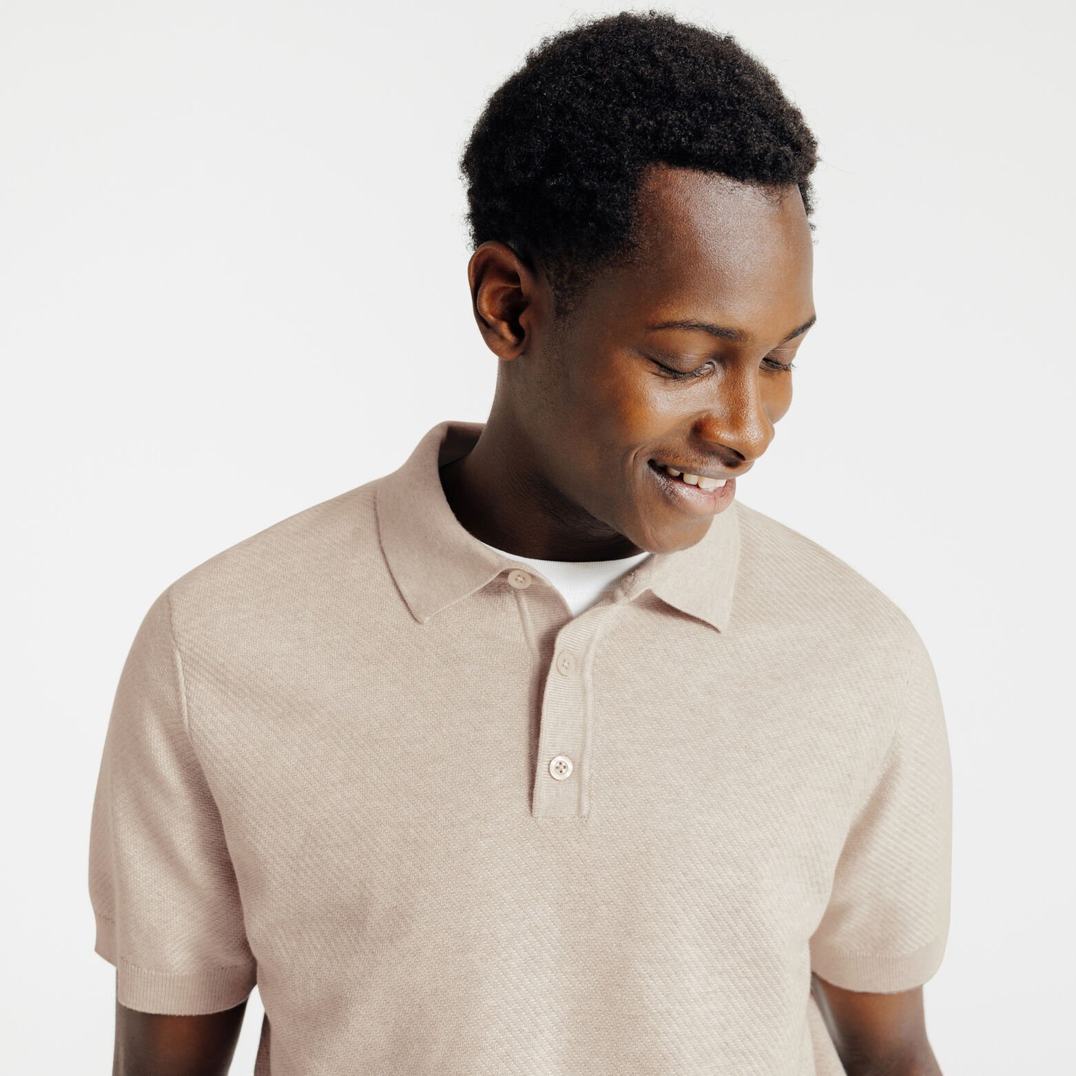 Polo en maille col boutonn&eacute; jeux de points