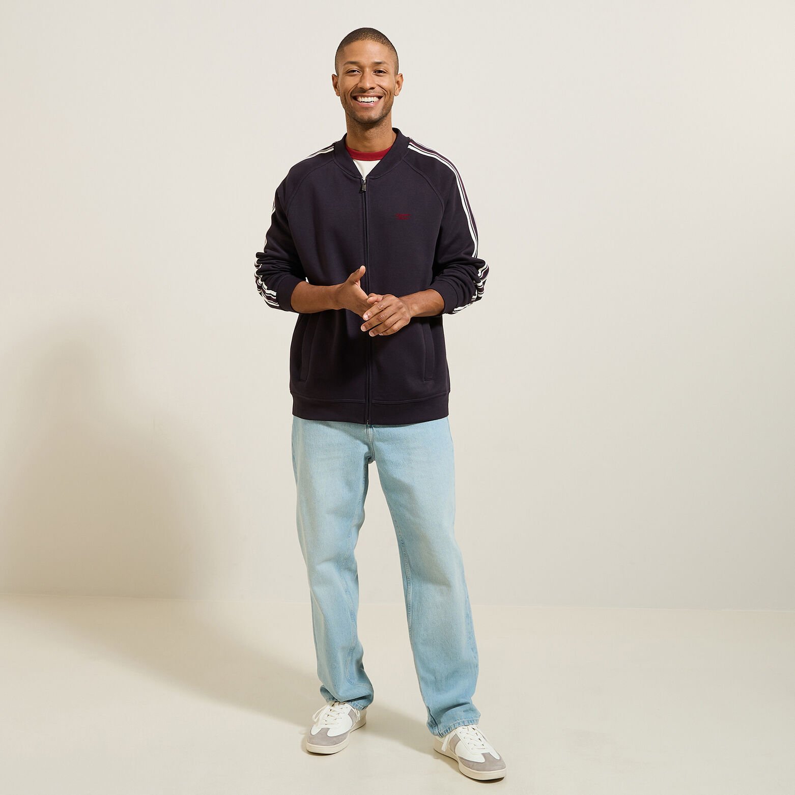 Sweater met rits en mouwstrepen