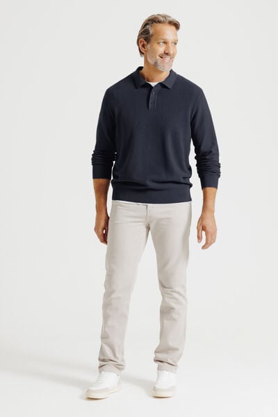 Polo in tricot met fantasie stekenpatroon en knoop