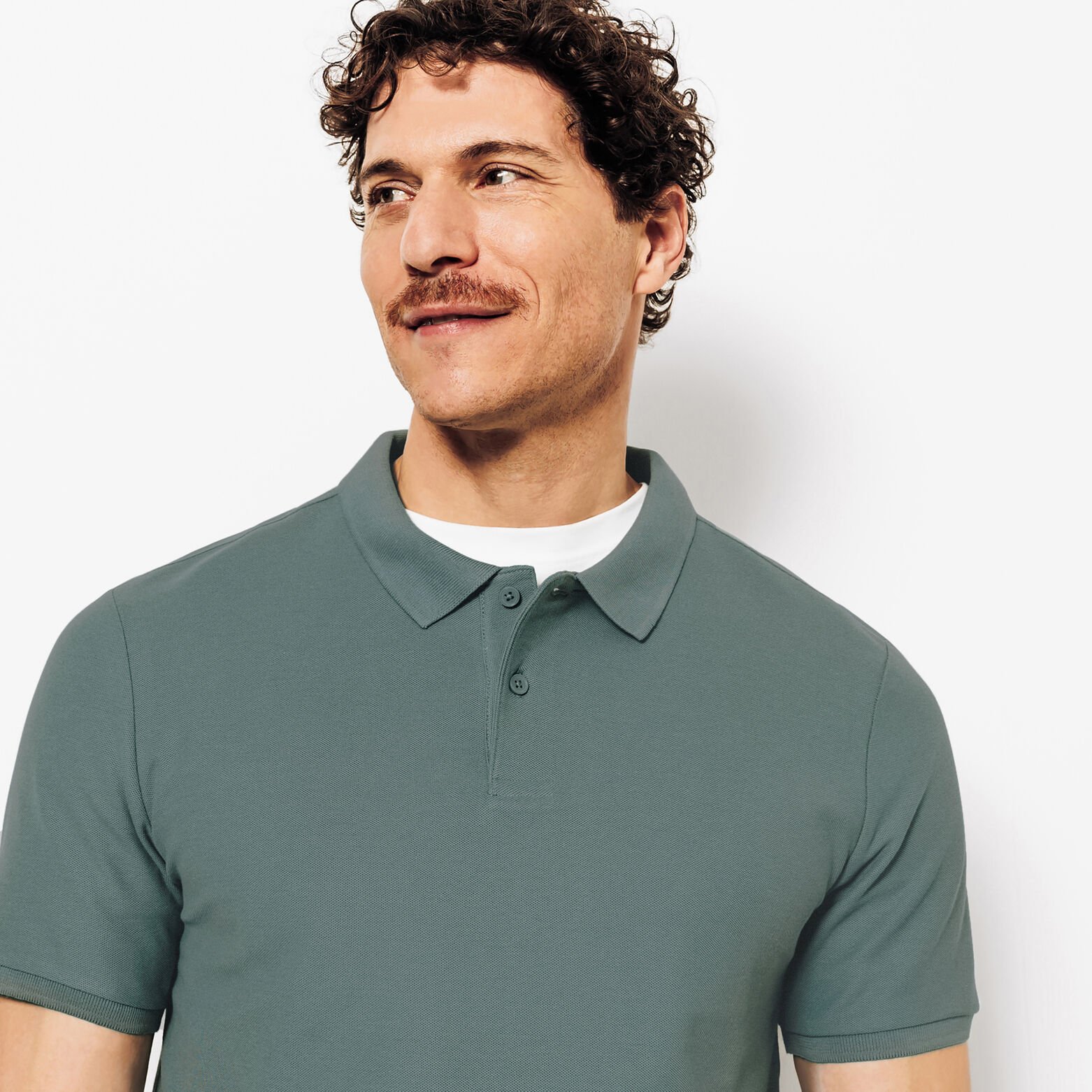 Effen polo in piqu&eacute;katoen met korte mouwen