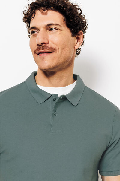 Effen polo in piqu&eacute;katoen met korte mouwen