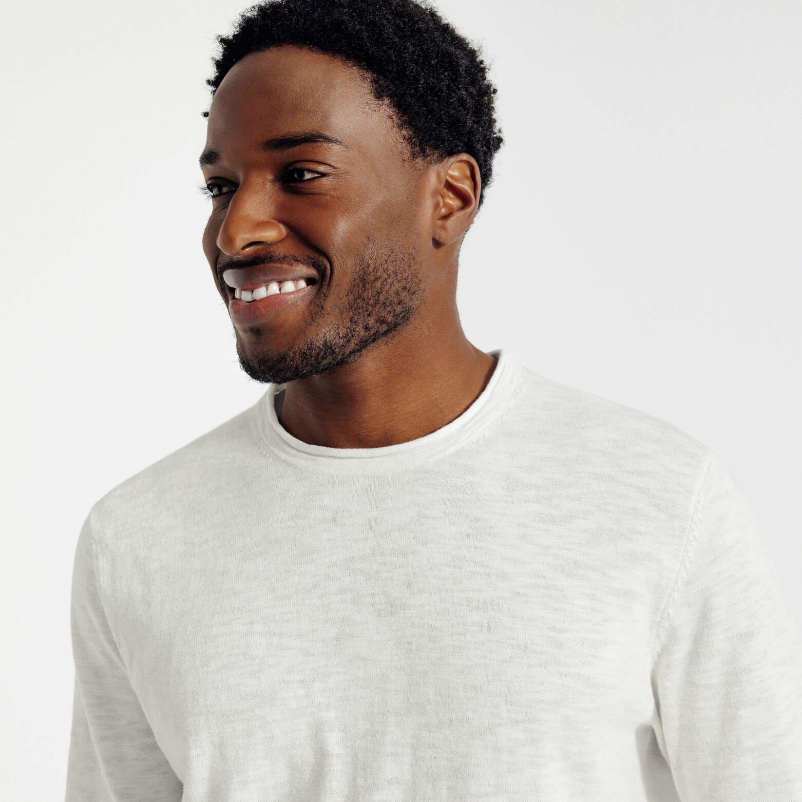 Pull col rond finition roulott&eacute;e