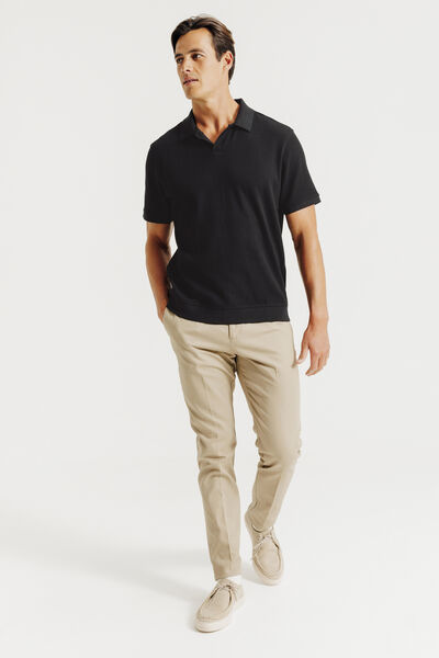 Polo in textuurstof met korte mouwen en resortkraa