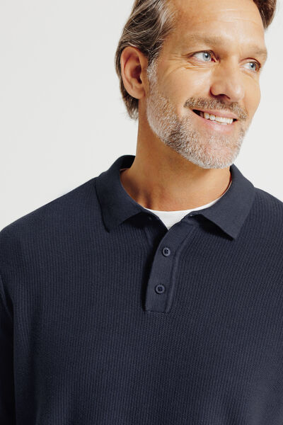 Polo in tricot met fantasie stekenpatroon en knoop